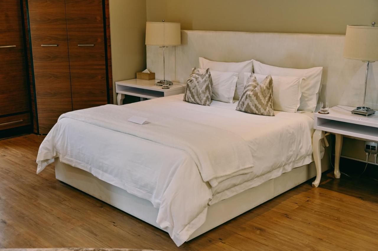 בלומפונטייין Tredenham Boutique Hotel מראה חיצוני תמונה A bed